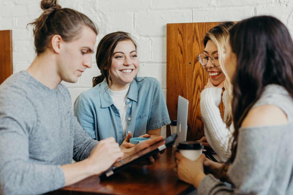 students in a room talking