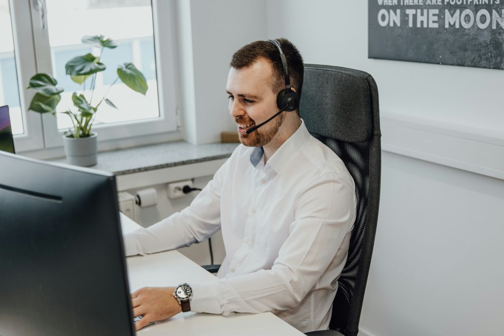 man working from home on his desk